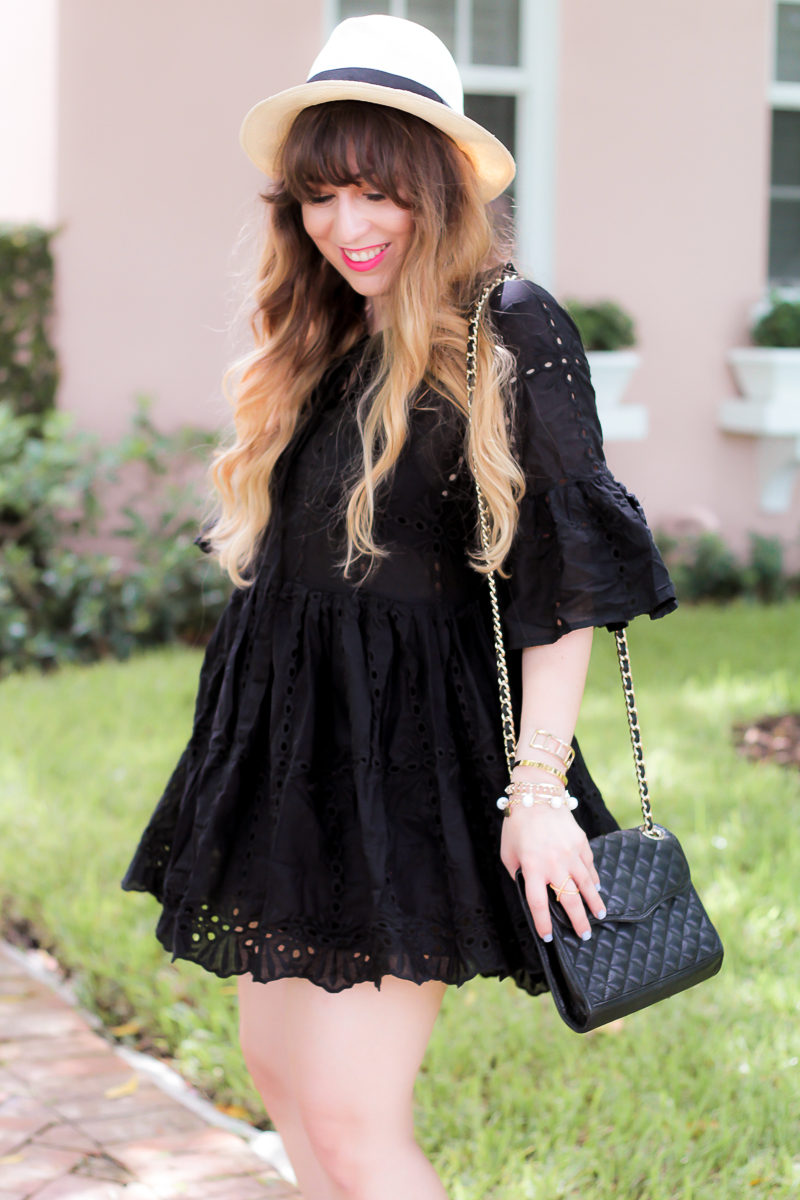 Miami fashion blogger Stephanie Pernas of A Sparkle Factor wearing a black eyelet babydoll dress