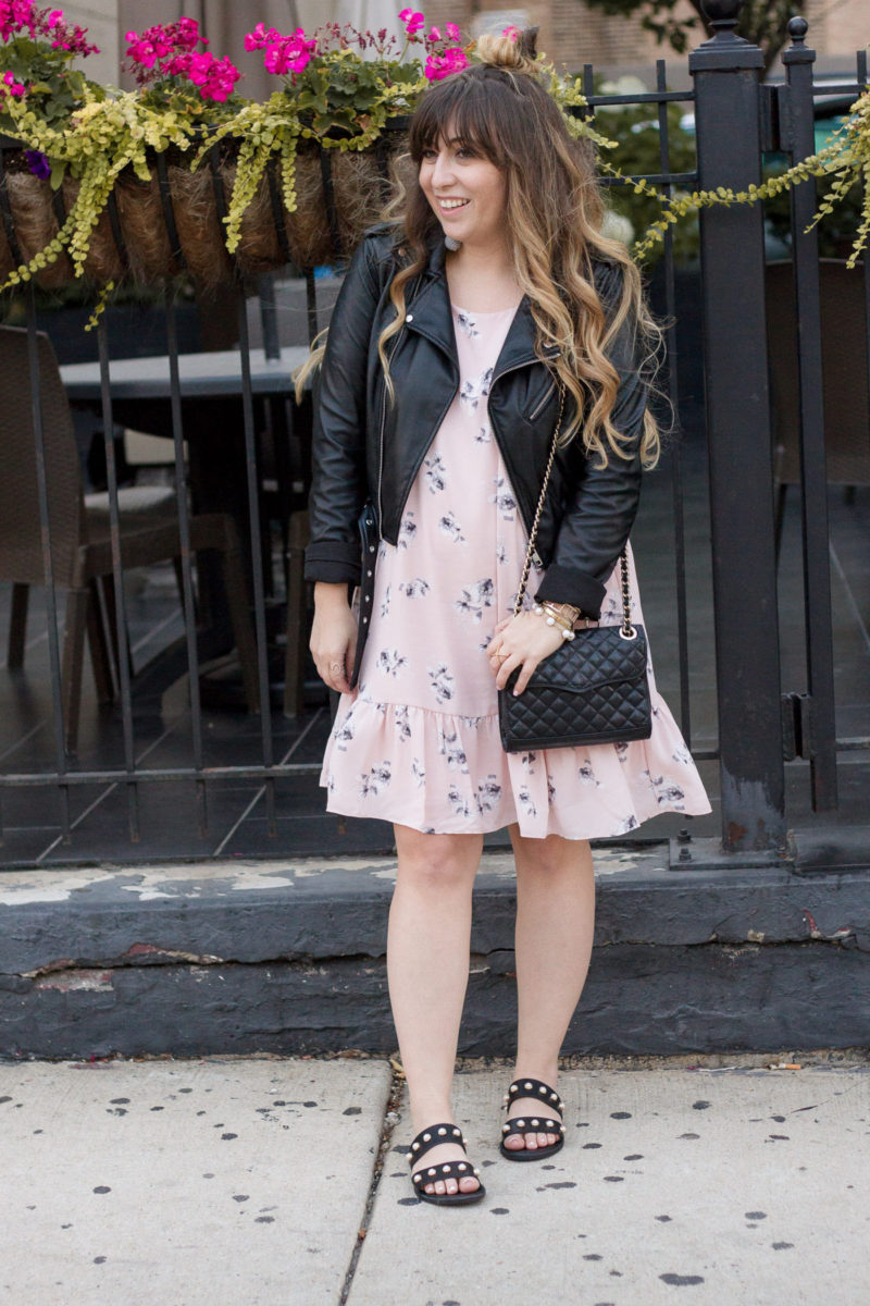 Miami fashion blogger Stephanie Pernas wearing an AQUA pink floral dropwaist dress and leather jacket