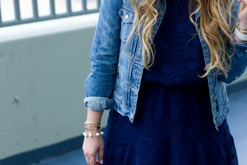 Miami fashion blogger Stephanie Pernas styles a jean jacket with a chiffon dress for summer