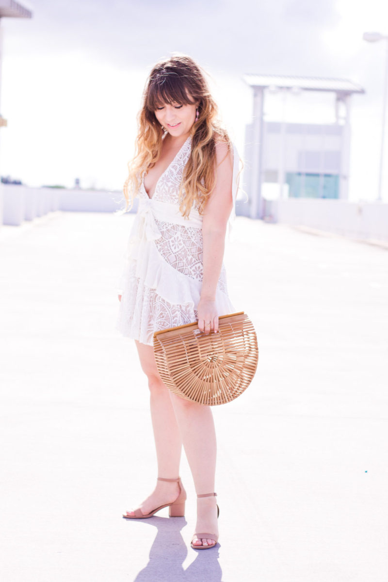 Miami fashion blogger Stephanie Pernas wearing a lace For Love + Lemons halter dress