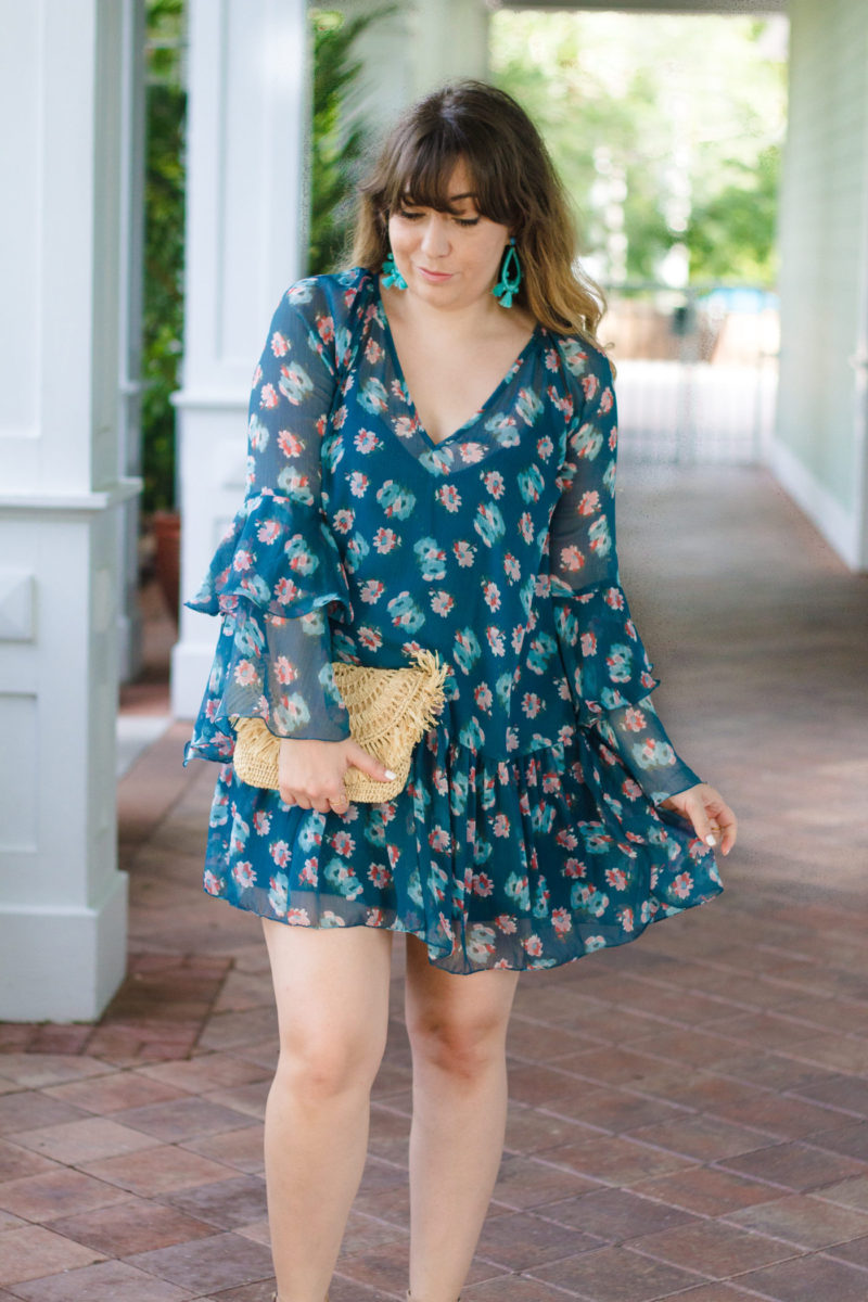 Fashion blogger Stephanie Pernas wearing a Nordstrom bell sleeve dress 