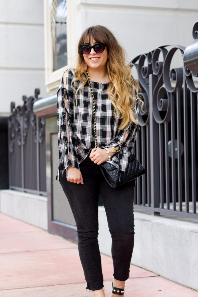 Miami fashion blogger Stephanie Pernas wearing a LOFT top and jeans 