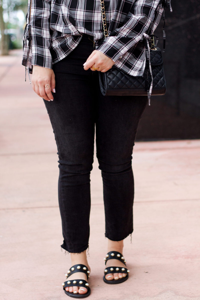 Miami fashion blogger Stephanie Pernas styles a plaid top and jeans for fall 