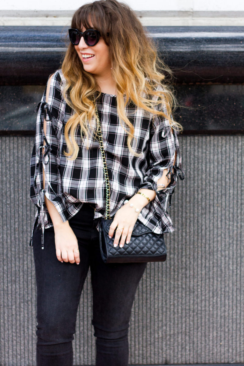 Miami fashion blogger Stephanie Pernas styles a LOFT plaid top and black jeans for fall 