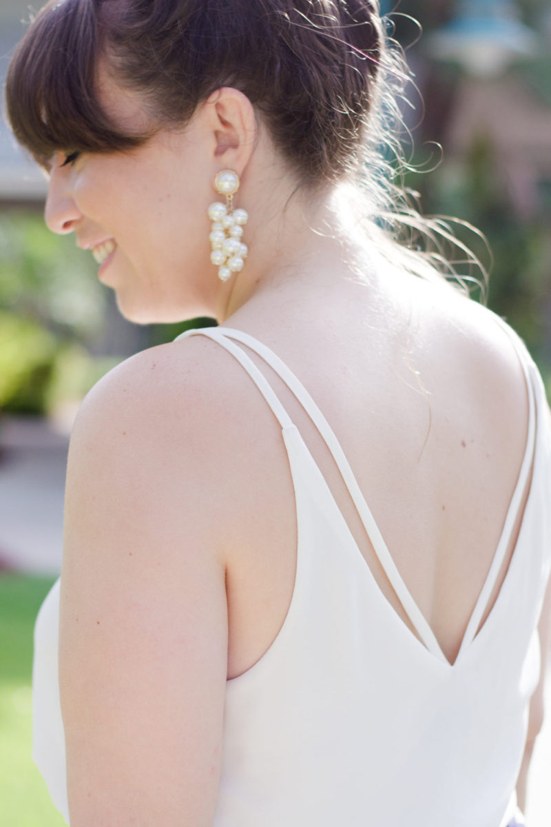 Miami style blogger Stephanie Pernas wearing Baublebar pearl cluster earrings and a Topshop camisole 