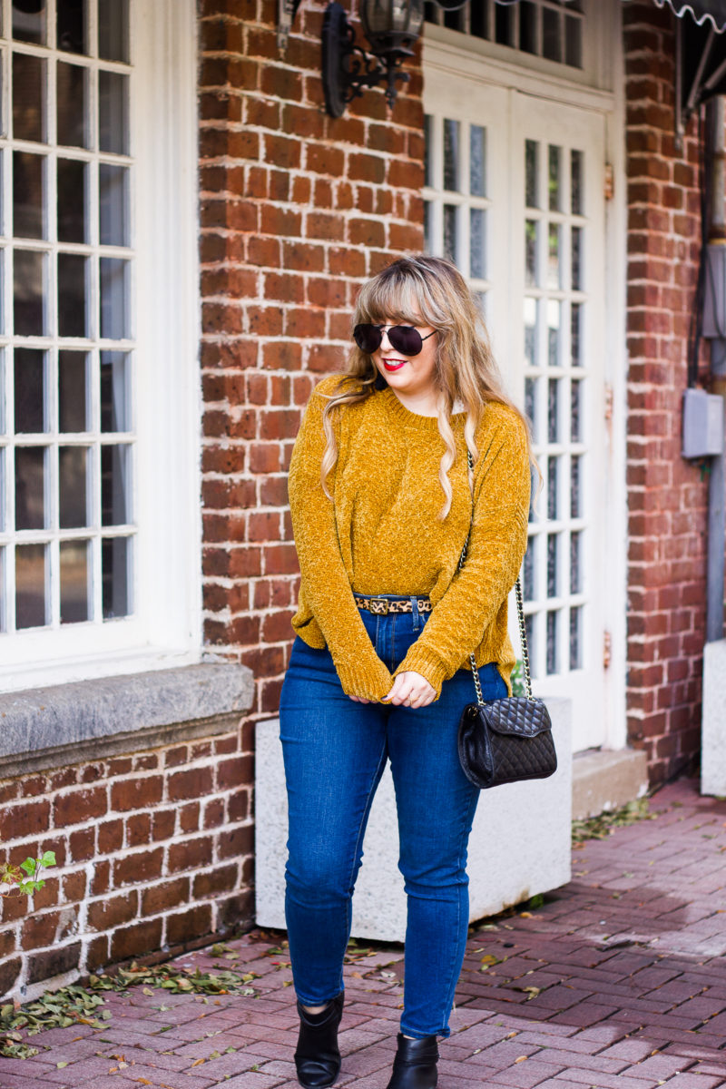 Casual gold sweater and jeans outfit