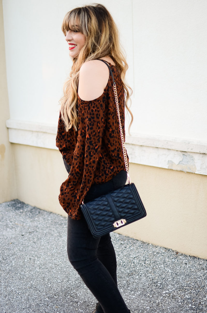 Cold shoulder top and tassel earrings