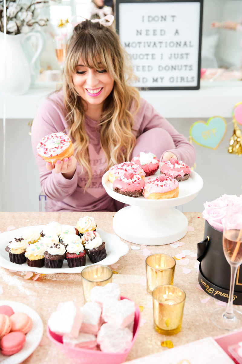 How to throw a Galentine's Day party: order special Galentine's Day donuts for your gals