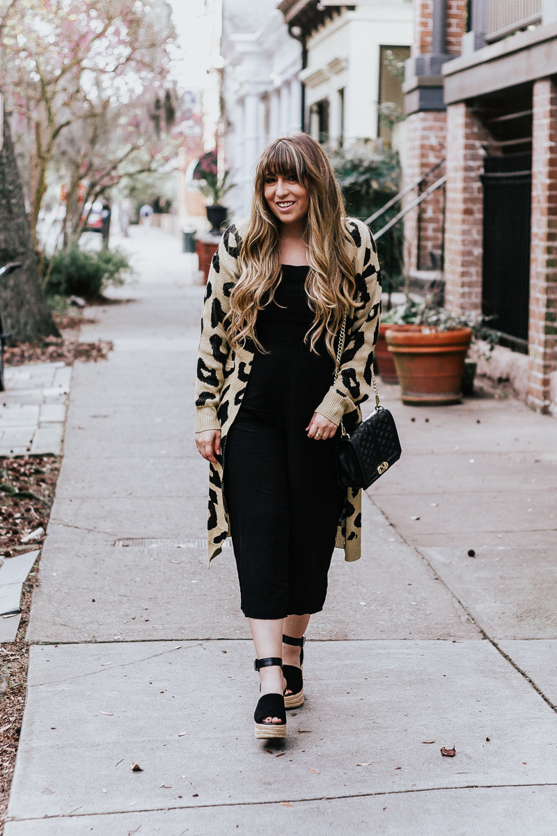 black jumpsuit with wedges