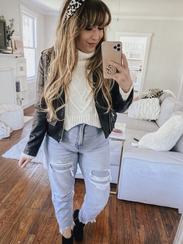 fall outfit idea - leather moto jacket, cropped turtleneck sweater, mom jeans and booties