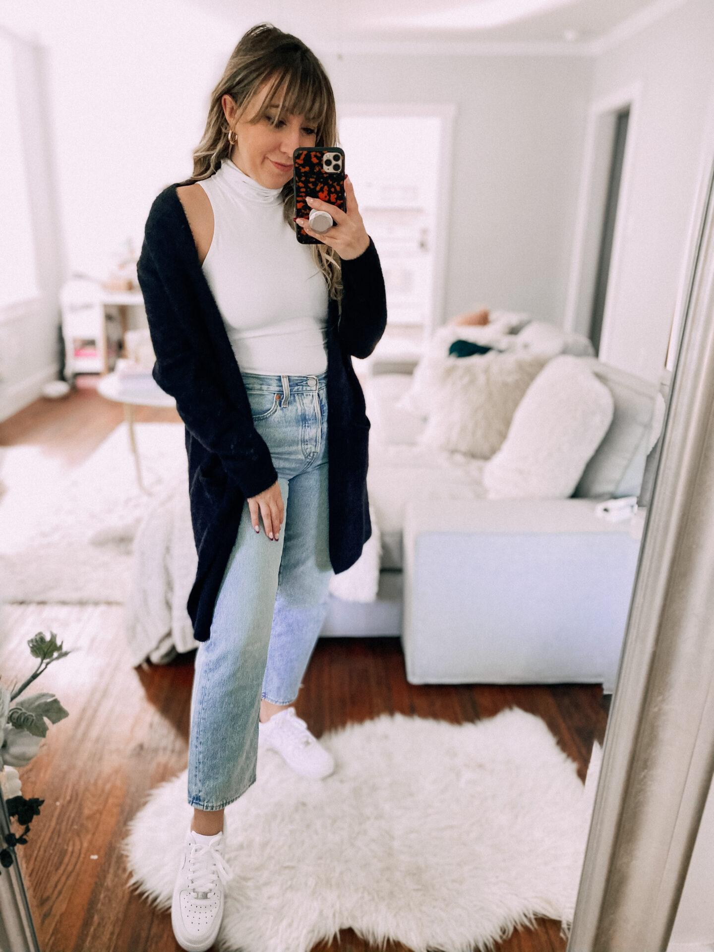 Turtleneck bodysuit and jeans