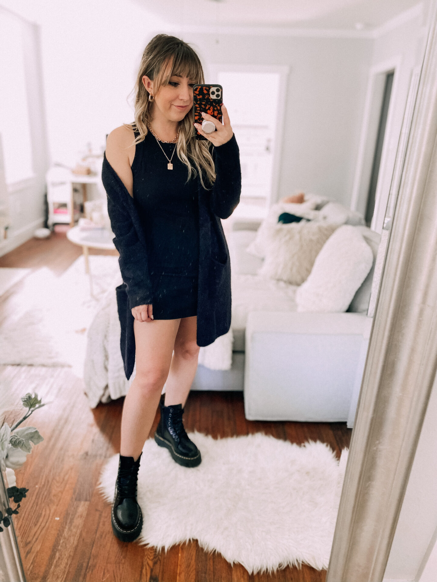 Black ribbed tank dress and fuzzy cardigan outfit