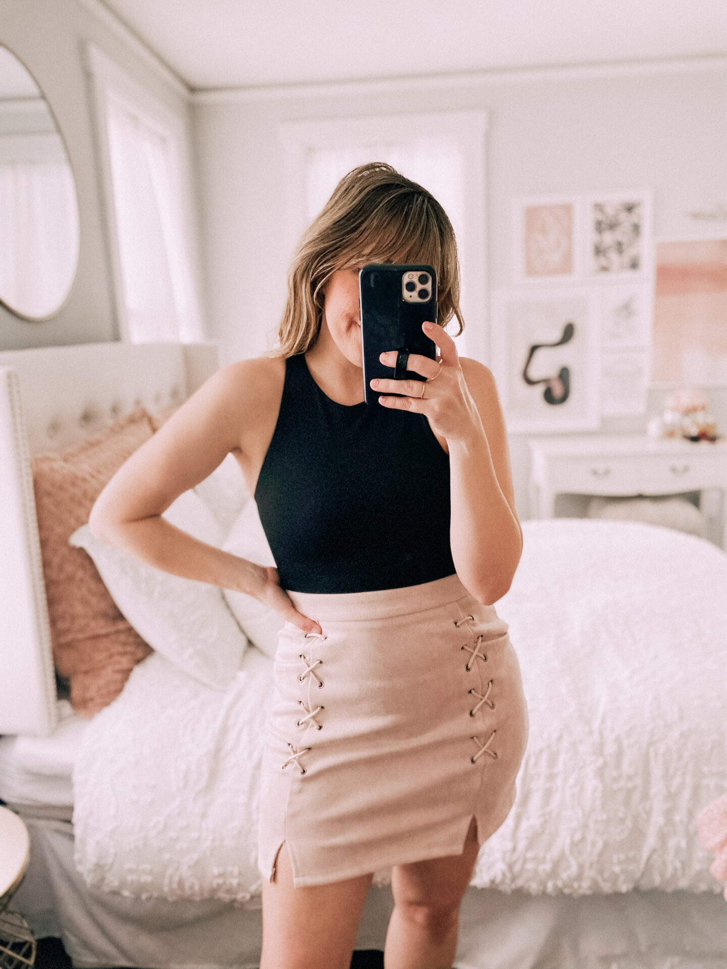 Amazon bodysuit and suede skirt