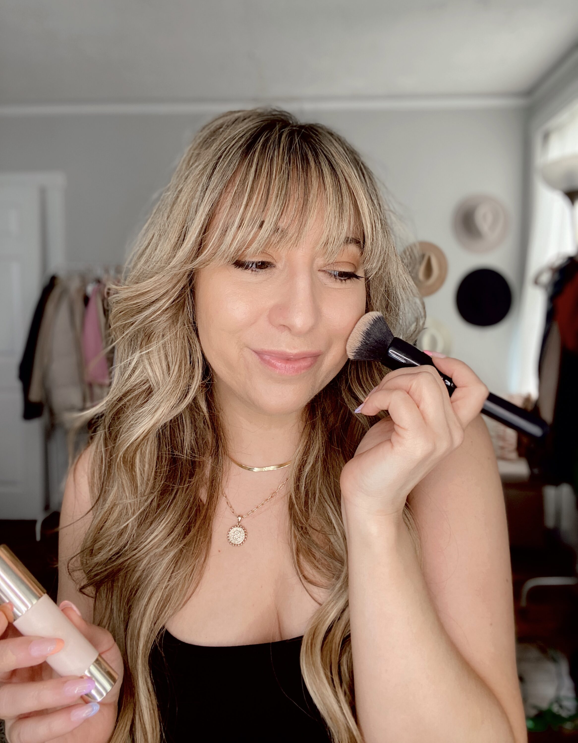 Influencer Stephanie Pernas shares tips on where to place and apply cream bronzer for a sunkissed glow