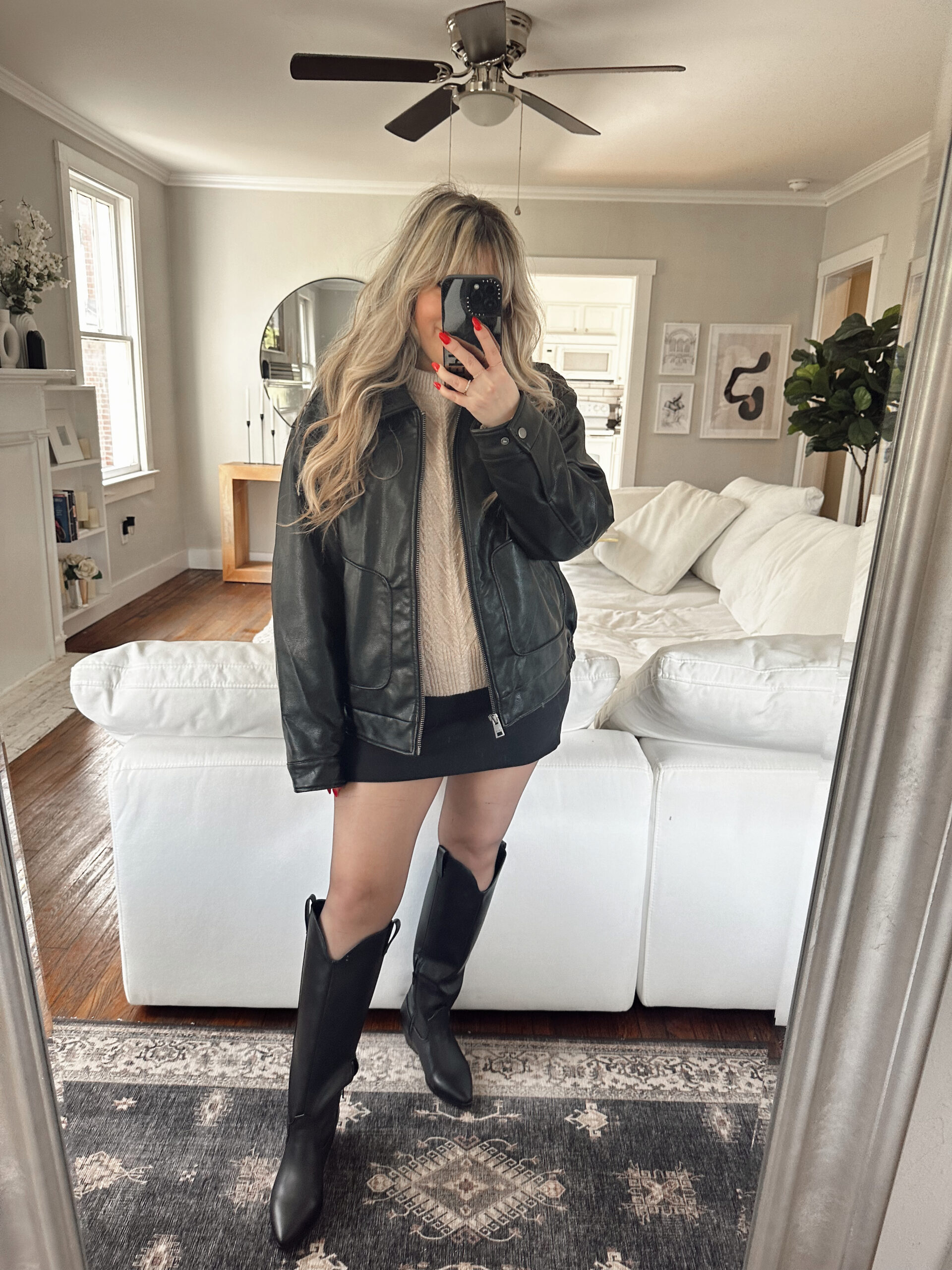 leather bomber, cozy sweater, skirt and boots for a timeless winter outfit idea