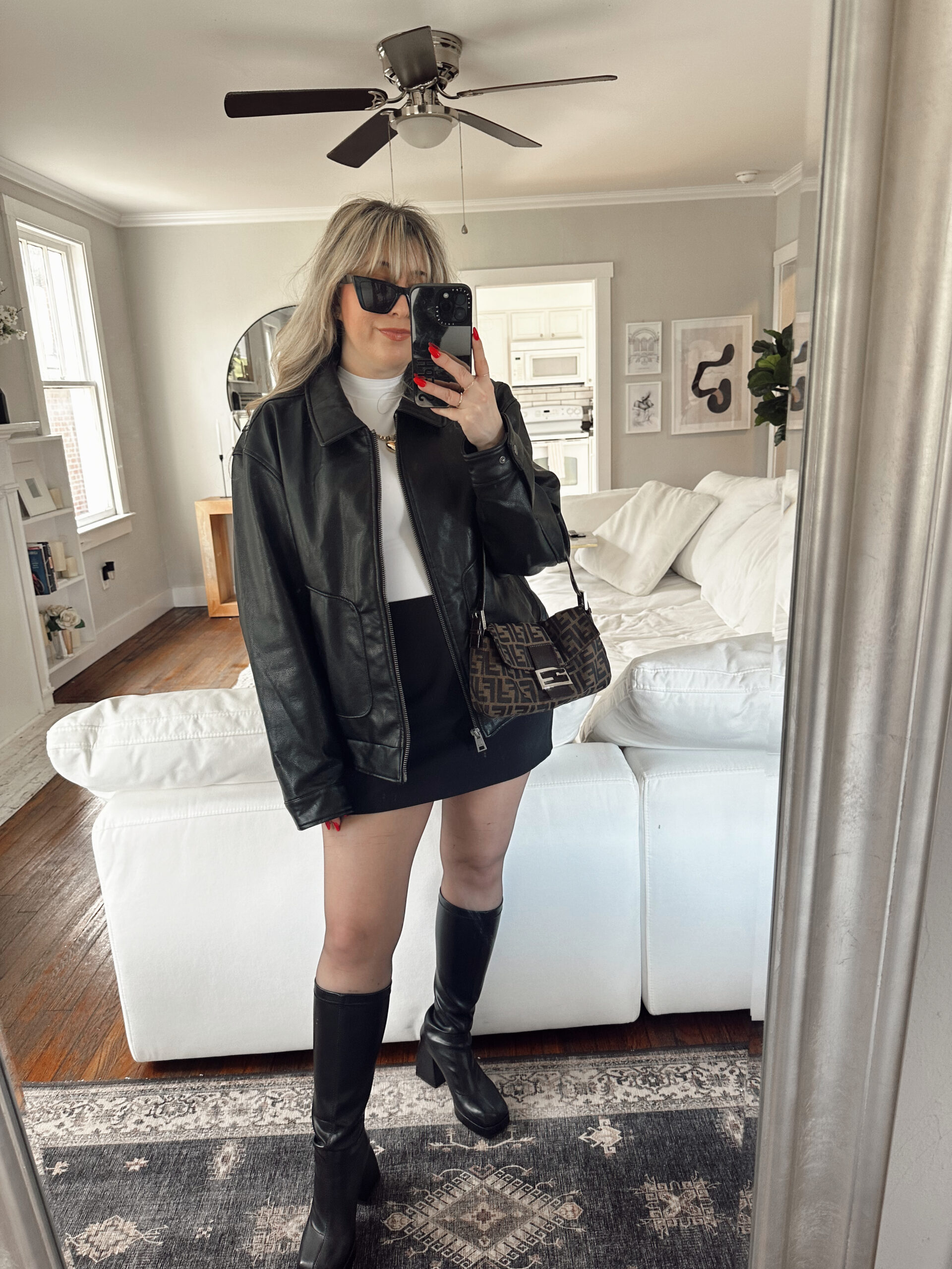 Winter Outfit - Leather bomber jacket, mini skirt and boots