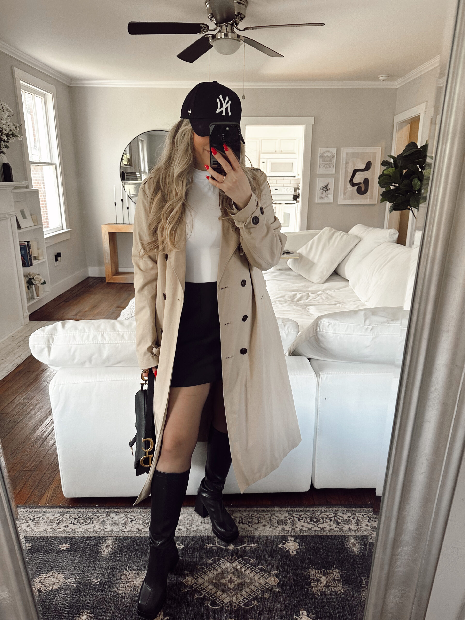 Classic trench outfit - baseball cap, skirt, and boots